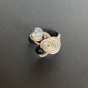 Black and silver ring